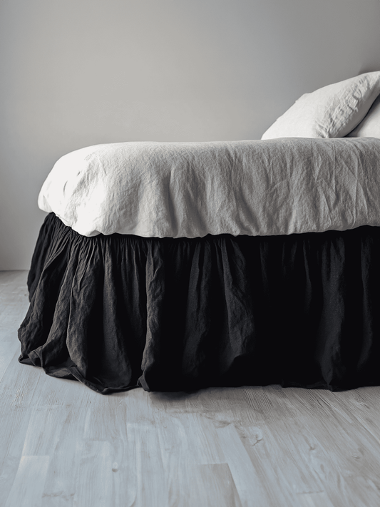 Black ruffled bed skirt