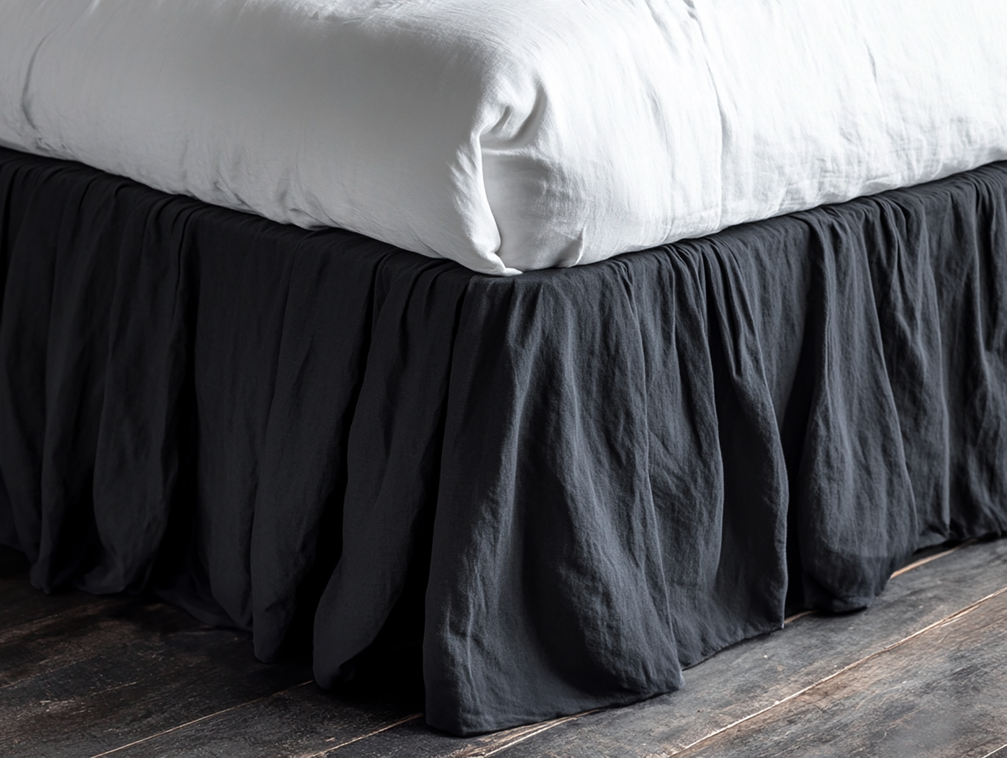 Dark gray ruffled bed skirt