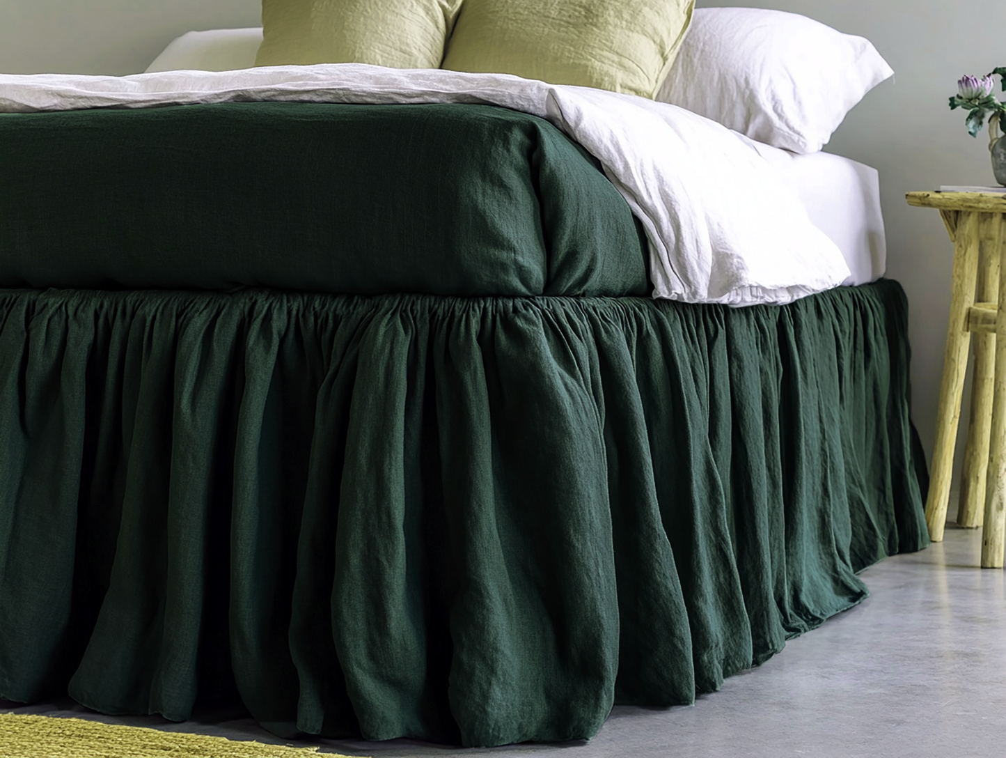 Dark green ruffled bed skirt