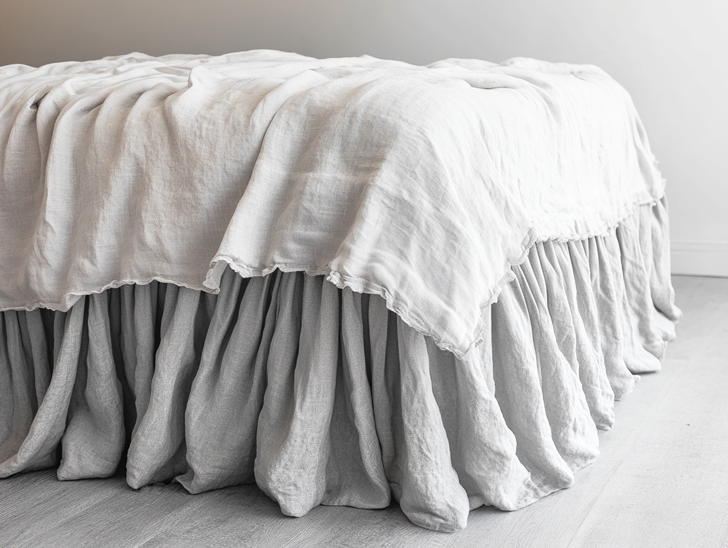 Light gray ruffled bed skirt