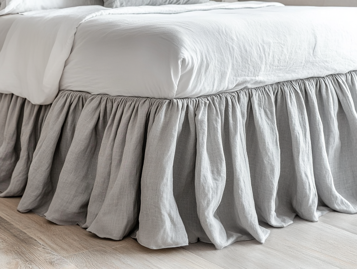 Light gray ruffled bed skirt