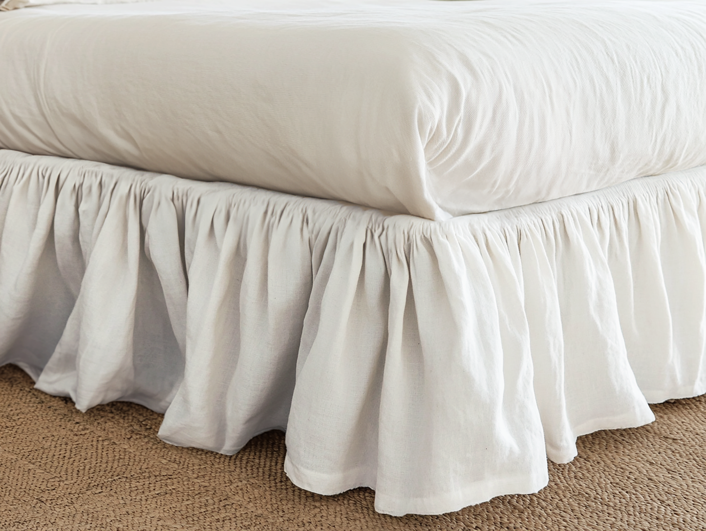 White ruffled bed skirt